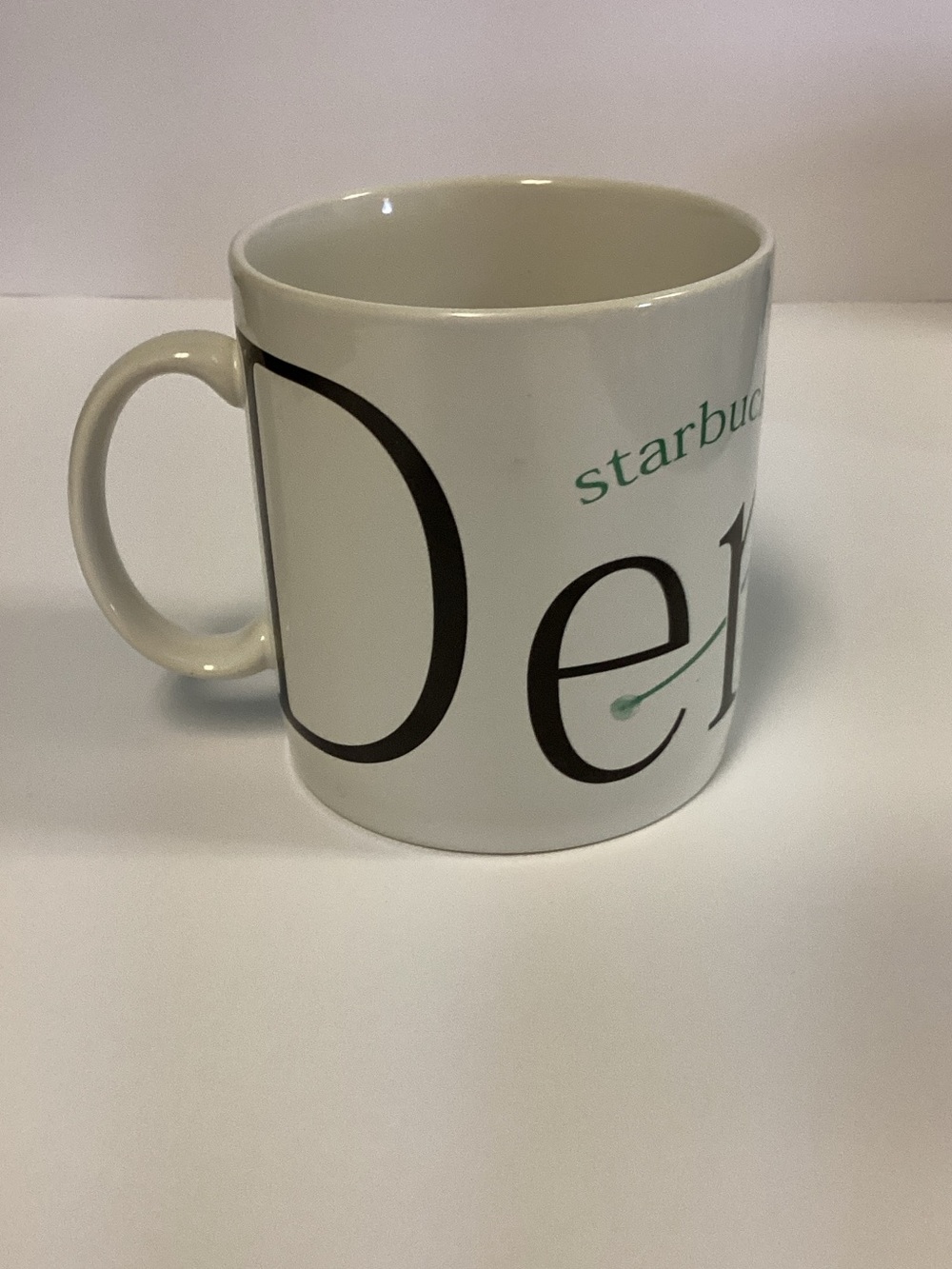 Starbucks White Ceramic Mug with Black and Green Logo Text 1994